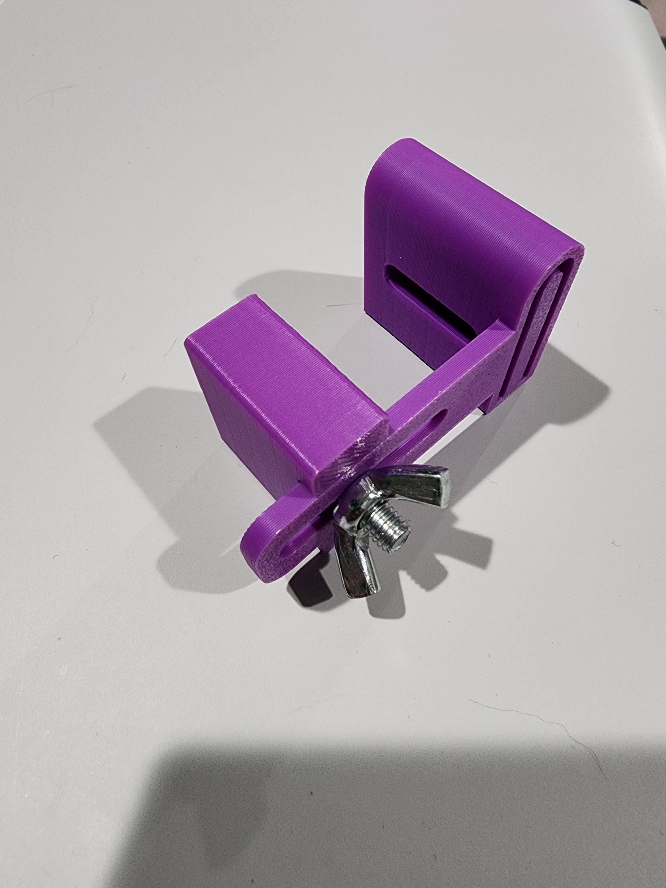 Third Hand Binding Folder Clip streamlines binding for quilting & sewing projects secures fabric ensures smooth feeding for perfect binding